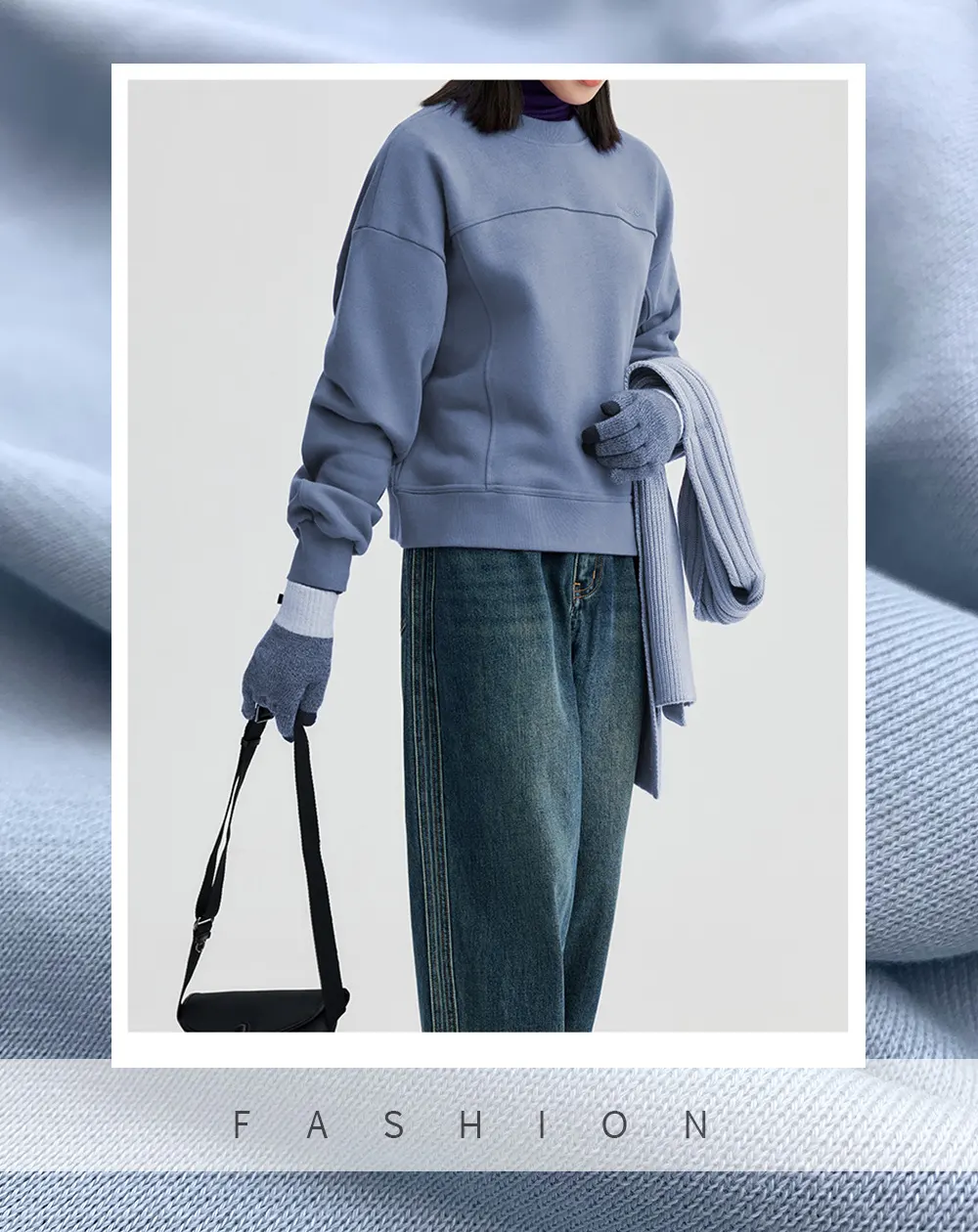 The model wears a hoodie crafted from heavyweight fleece fabric
