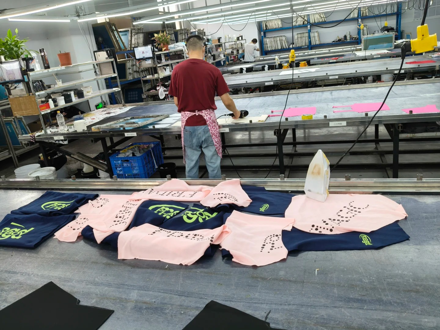 Screen printing production line at a garment printing factory