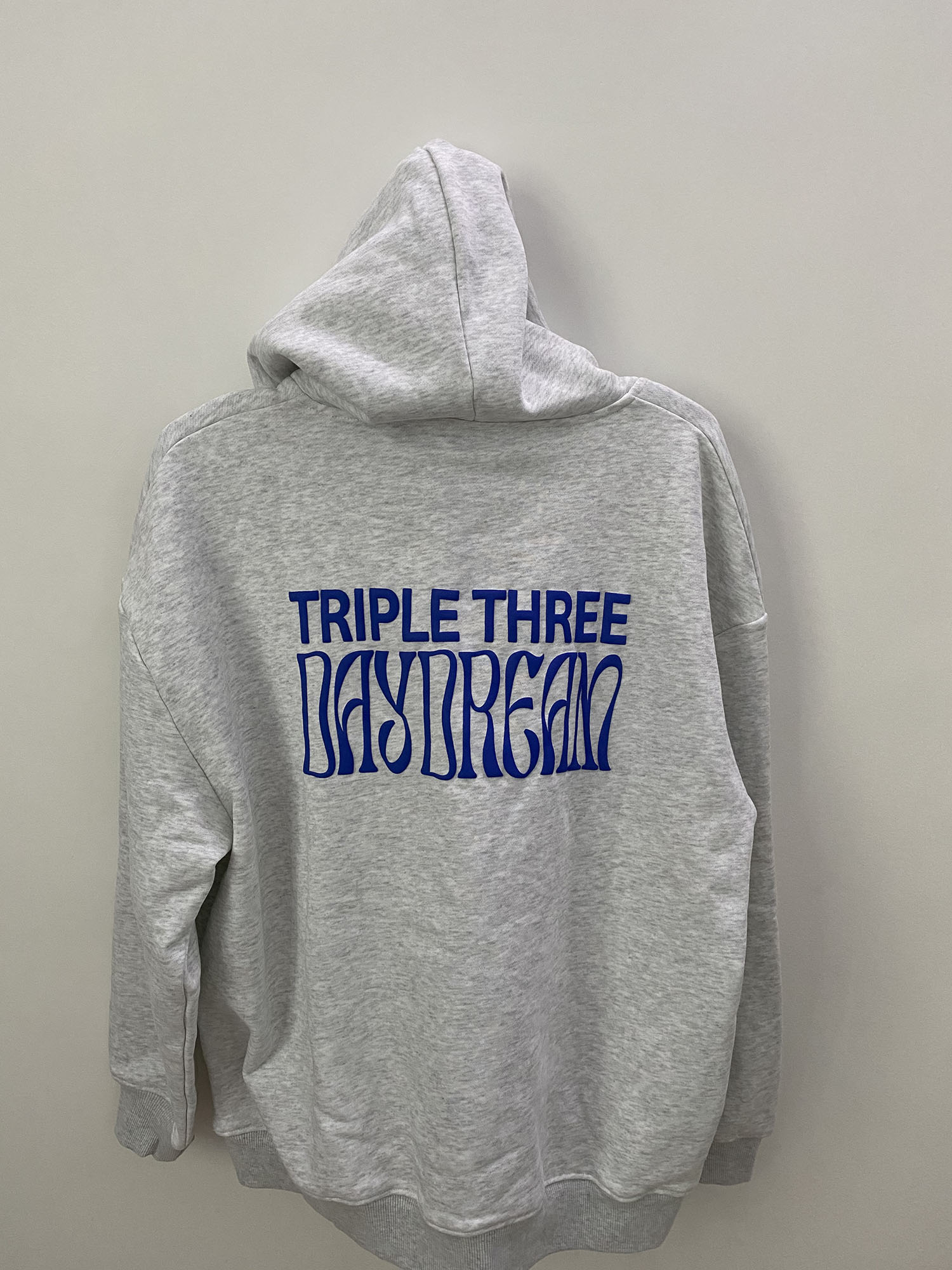 The back of Ines's custom hoodie puff printing